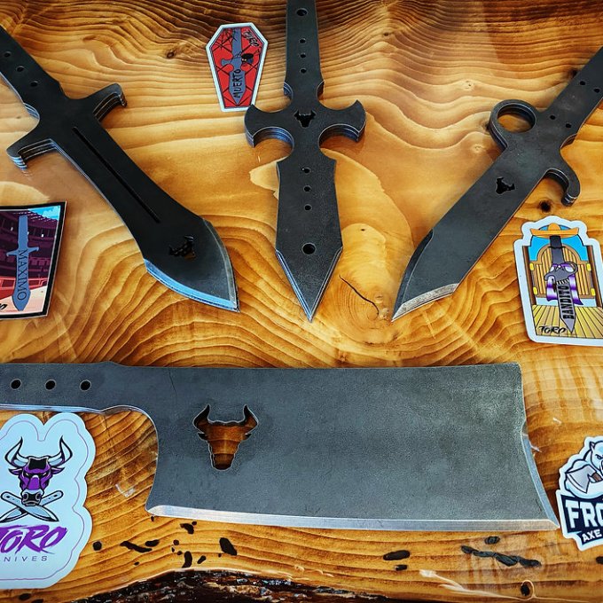 a group of shoes on top of a wooden cutting board