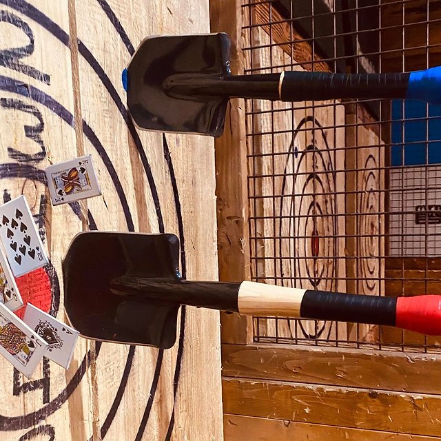 a bicycle leaning against a wall